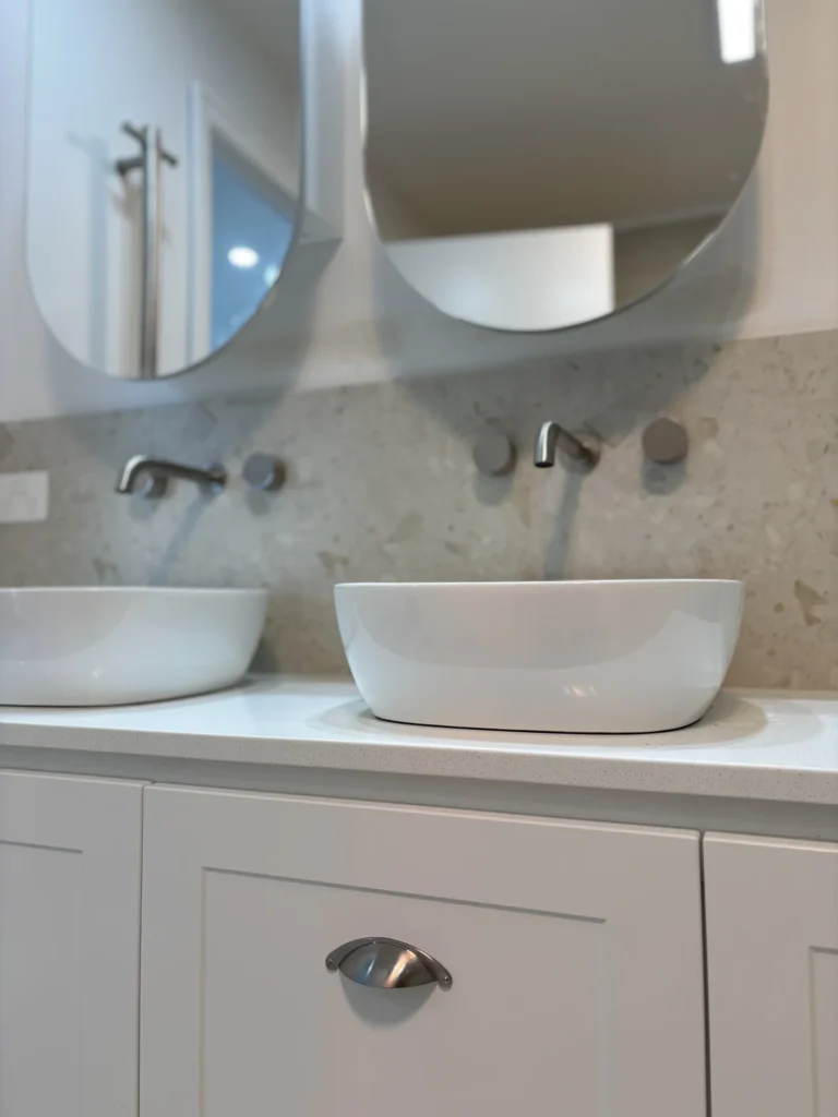 Twin bathroom sinks in an Alstonville renovation by Canstruct Builders.