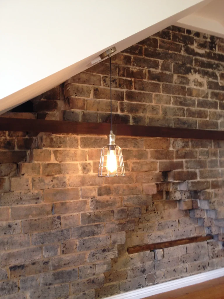 Bedroom ceiling lamp in a heritage renovation in Surry Hills.